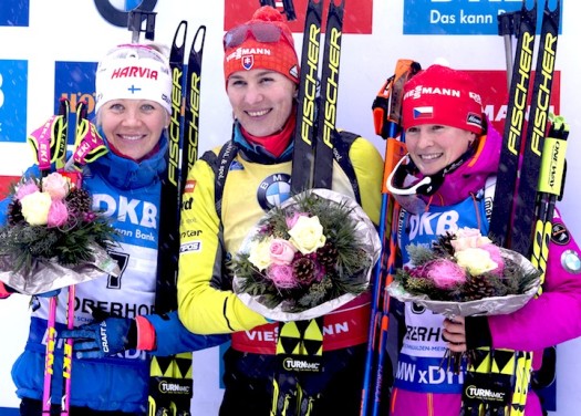 Women's podium (l-r) Makarainen 2nd, Kuzmina 1st, Vitkova 3rd [P] Nordic Focus
