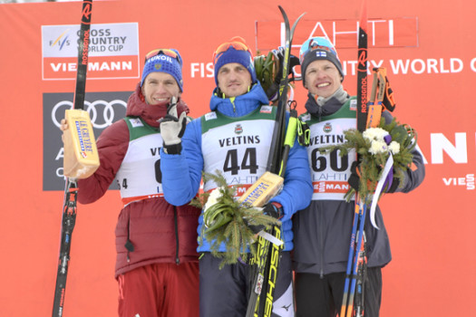 Men's podium (l-r) Bolshunov 2nd, Poltoranin 1st, Niskanen 3rd [P] Nordic Focus