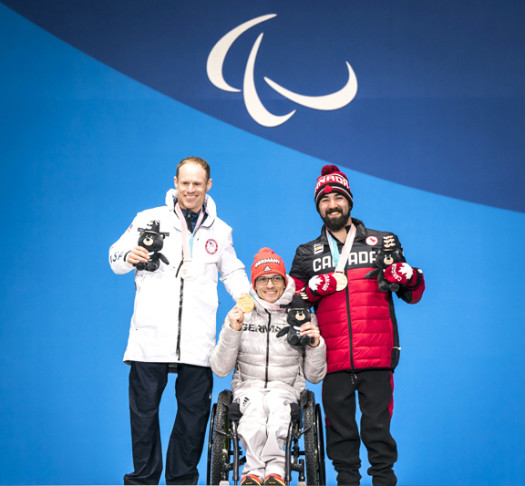 Men's 15km Sitting podium (l-r) Cnossen 2nd, Fleig 1st, Cameron 3rd [P] Canadian Paralympic Committee [P] Canadian Paralympic Committee