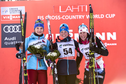 Women's podium (l-r) Nepryaeva 2nd, Parmakoski 1st, Bjoergen 3rd [P] Nordic Focus