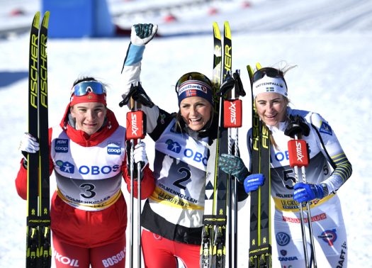 Women’s podium (l-r) Nepryaeva 2nd, Johaug 1st, Andersson 3rd [P] Nordic Focus