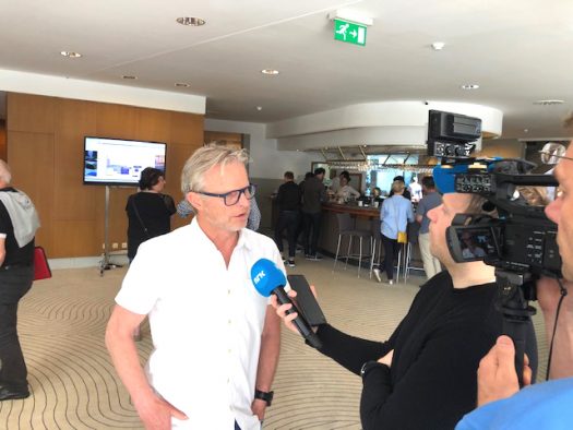 Norwegian delegate Age Skinstad talks with Norwegian TV NRK [P] Peter Graves