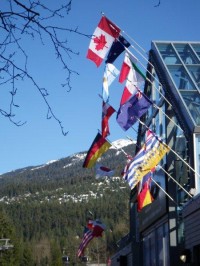 Flags adorn the Whistler gondola station. [P] Sandra Walter