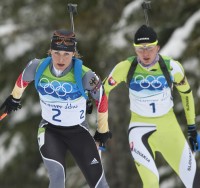 Magdelena Neuner (GER) leads Anastazia Kuzmina (SVK) [P] Heinz Ruckemann