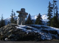 An inukshuk against a scenic background at the entrance to Whistler Olympic Park. [P] Sandra Walter