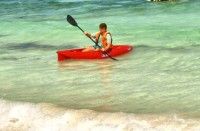 My Dad out for a kayak in the surf