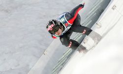 A female ski jumper at the...