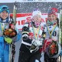 Podium celebrations (l-r) Matveeva 2nd, Randall 1st, Caspersen Falla 3rd [P] Nordic Focus