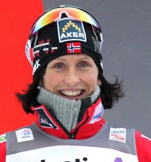 Marit Bjoergen (NOR) all smiles after...