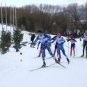 J2 boys with Ben Hegman (NE, Mansfield Nordic) leading a pack up the hill [P] Gunther Kern
