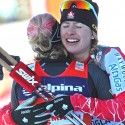 Kikkan Randall (USA) and Chandra Crawford (CAN) embrace after the FIS World Cup Sprint in Rogla. [P] Nordic Focus