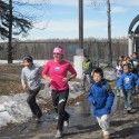Holly Brooks running with the kids at ARISE. [P] courtesy of Holly Brooks