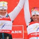 Sweden’s Ida Ingemarsdotter (l) and Charlotte Kalla celebrate silver [P] Nordic Focus