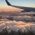 Tiny, tiny bits of snow on the mountains leaving Anchorage. Alaska, similar to many places all over the world is experiencing a horribly dry winter. [P]Holly Brooks