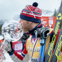 Martin Sundby of Norway kisses his Crystal Globe as overall World Cup winner following the Ski Tour Canada in Canmore [P] Pam Doyle photo