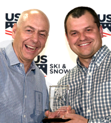 Yuriy Gusev accepts the Russell Wilder Award at the U.S. Ski & Snowboard Congress in Park City, Utah [P] U.S. Ski & Snowboard